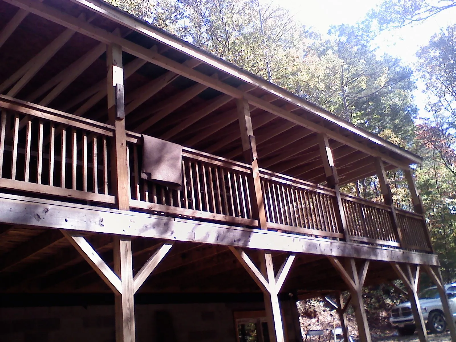 Timber framing under a new elevated porch and deck — Roof Leak Repair in Phoenix by Roofing Brothers